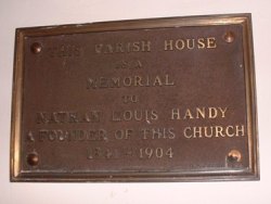 Tablet reading: This Parish House is a Memorial to Nathan Louis Handy
 a Founder of this Church 1841-1904